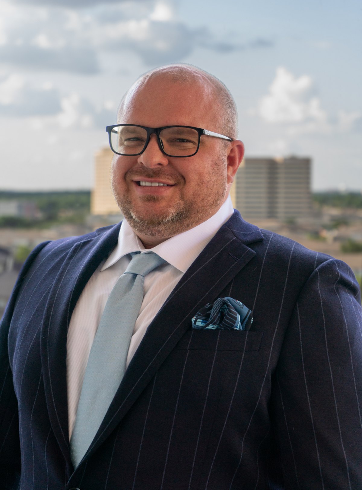Business headshot, studio lighting